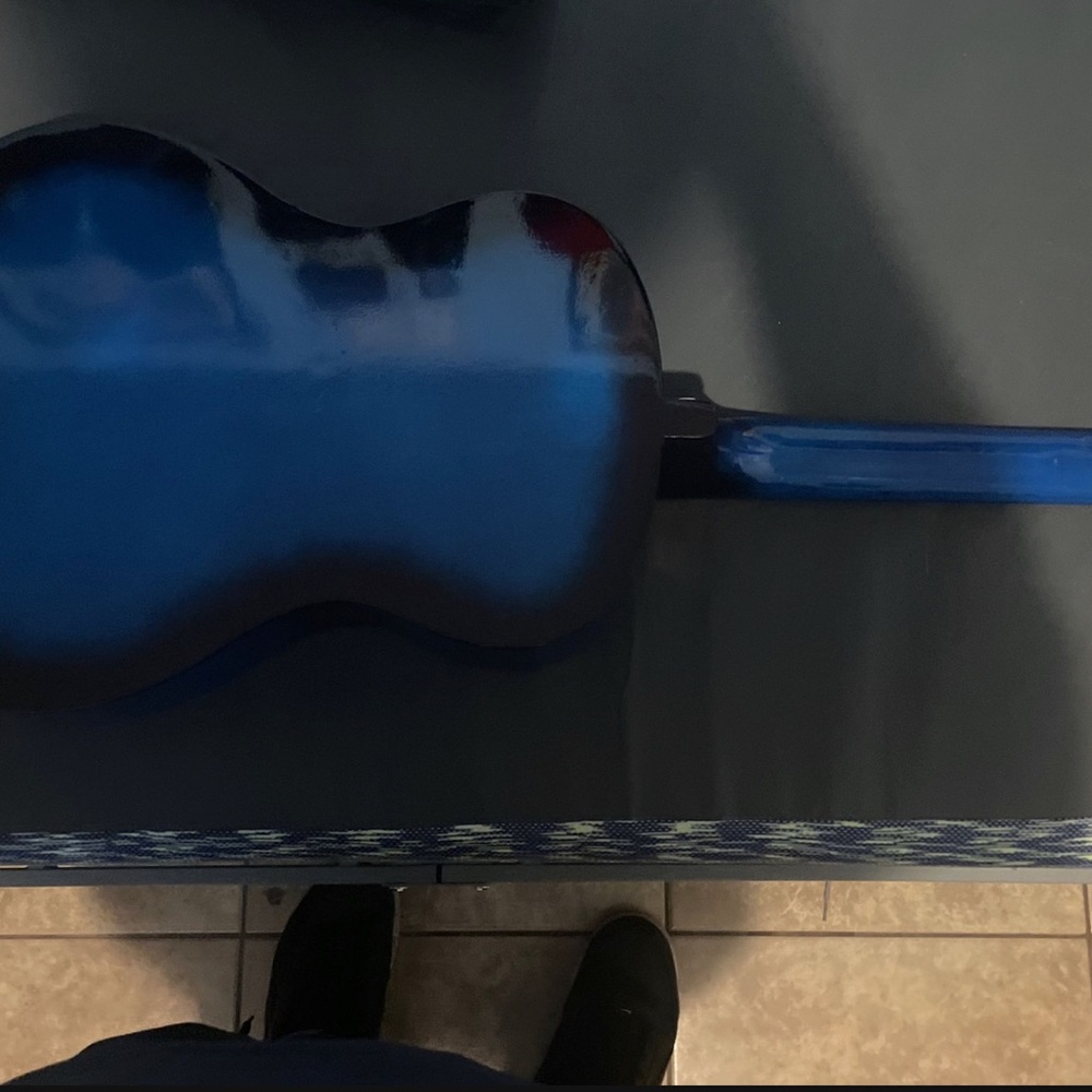 Guitar , blue brand new just has a little scratches on it